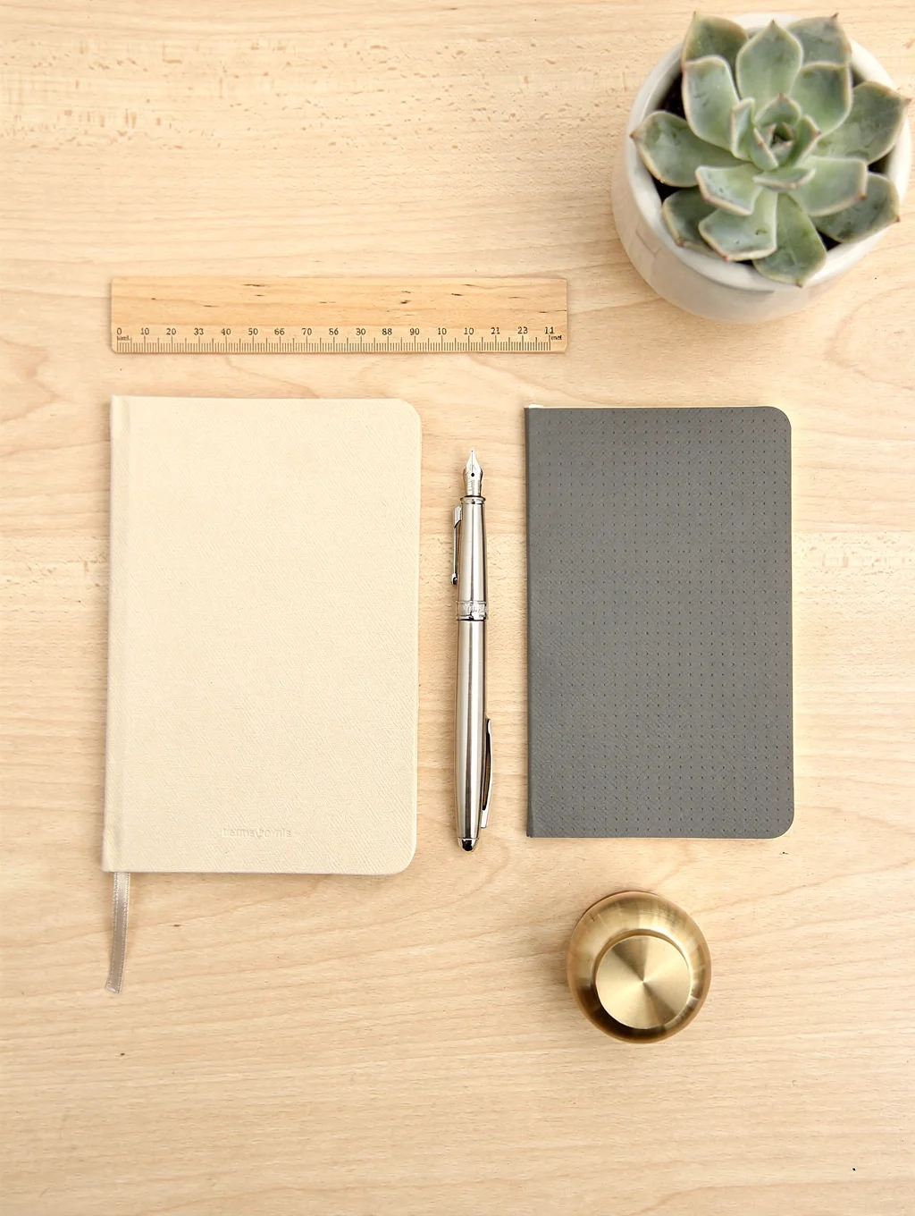 Assorted promotional items featuring company logos on a desk